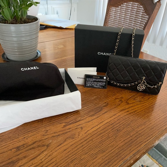 CHANEL Handbags - LIMITED EDITION CHANEL Black Quilted Leather Shoulder Bag with Gold Chain